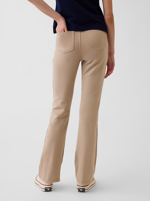 L'image numéro 4 présente Pantalon d’uniforme évasé en tricot point de Rome pour Enfant