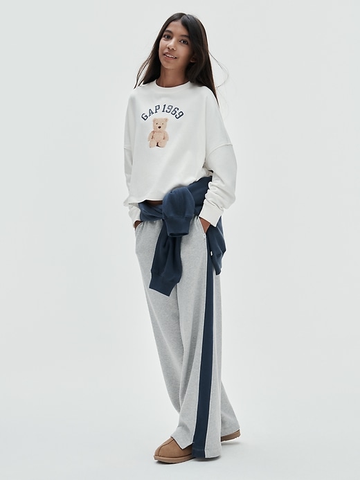L'image numéro 6 présente Pantalon ballon en coton ouaté VintageDoux de style universitaire pour Enfant